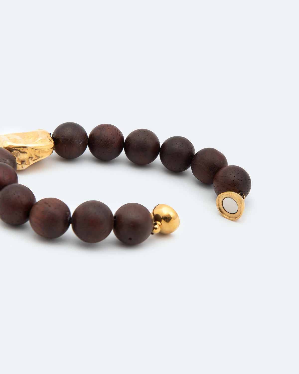 BRACCIALE CON BOULES IN LEGNO