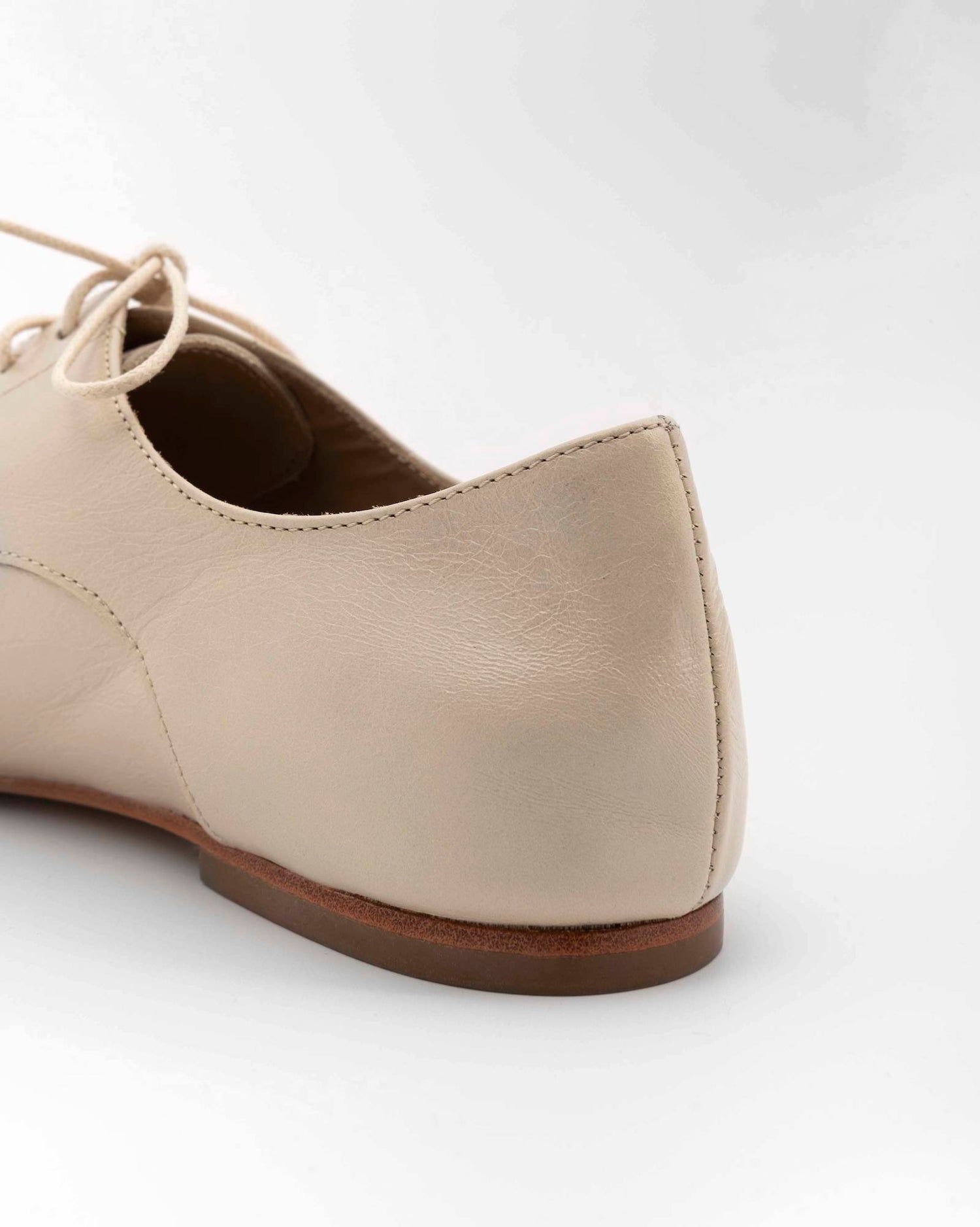 STRINGATA IN PELLE