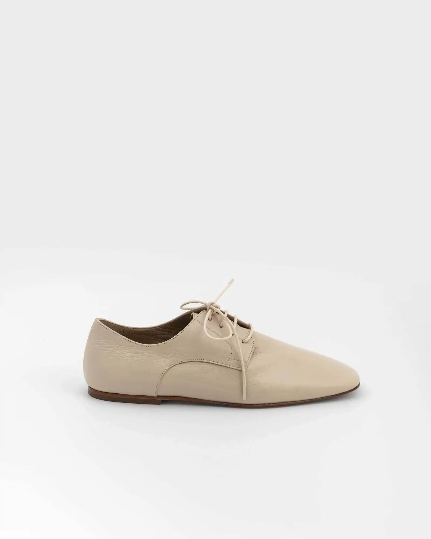 STRINGATA IN PELLE