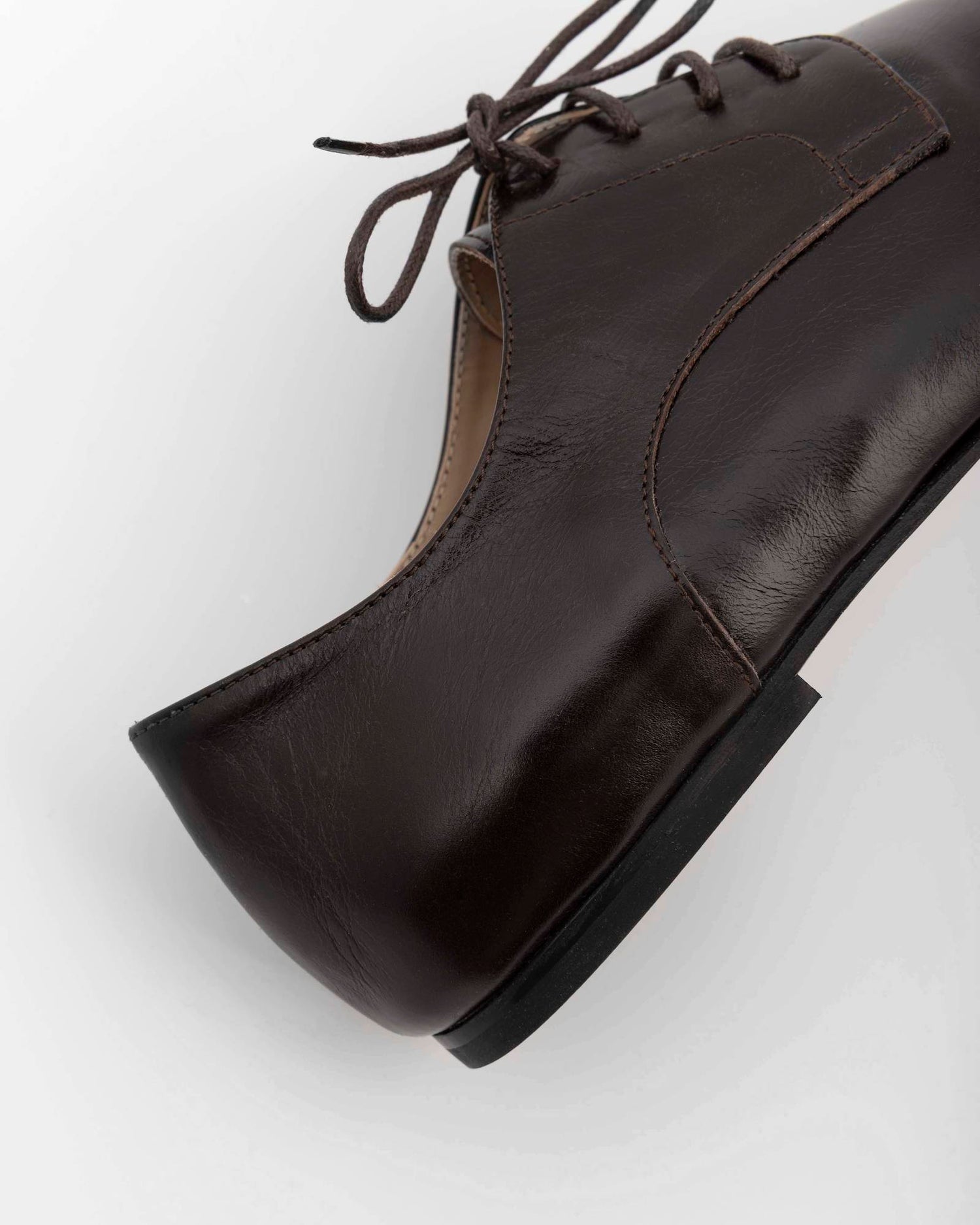 STRINGATA IN PELLE